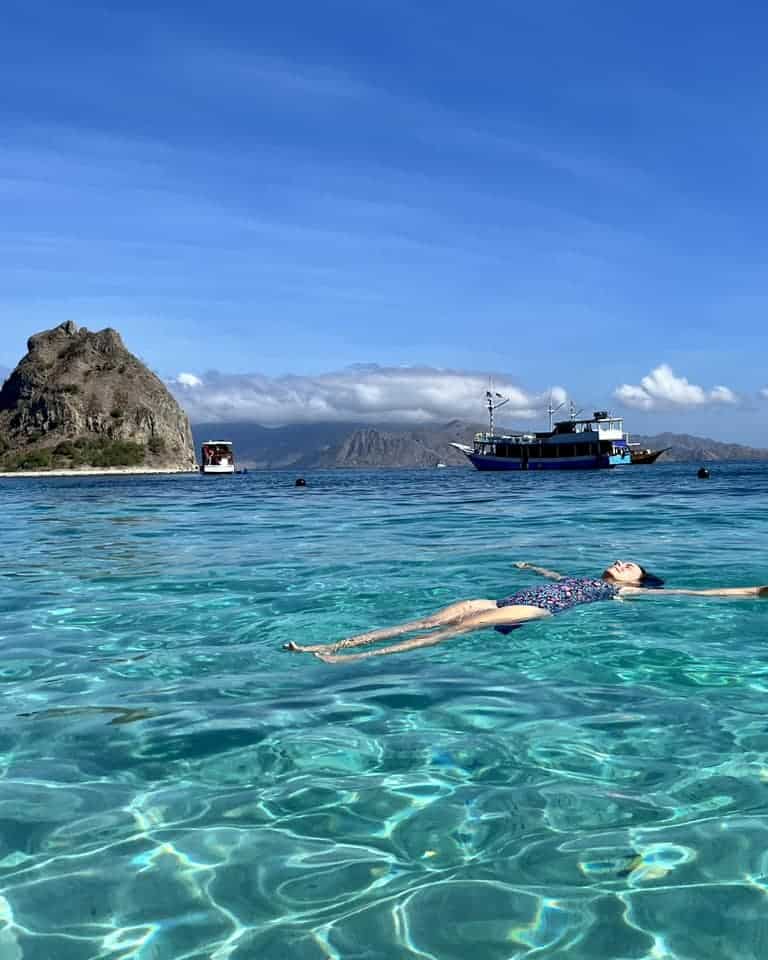 Floating in the water on a Komodo Island boat tour