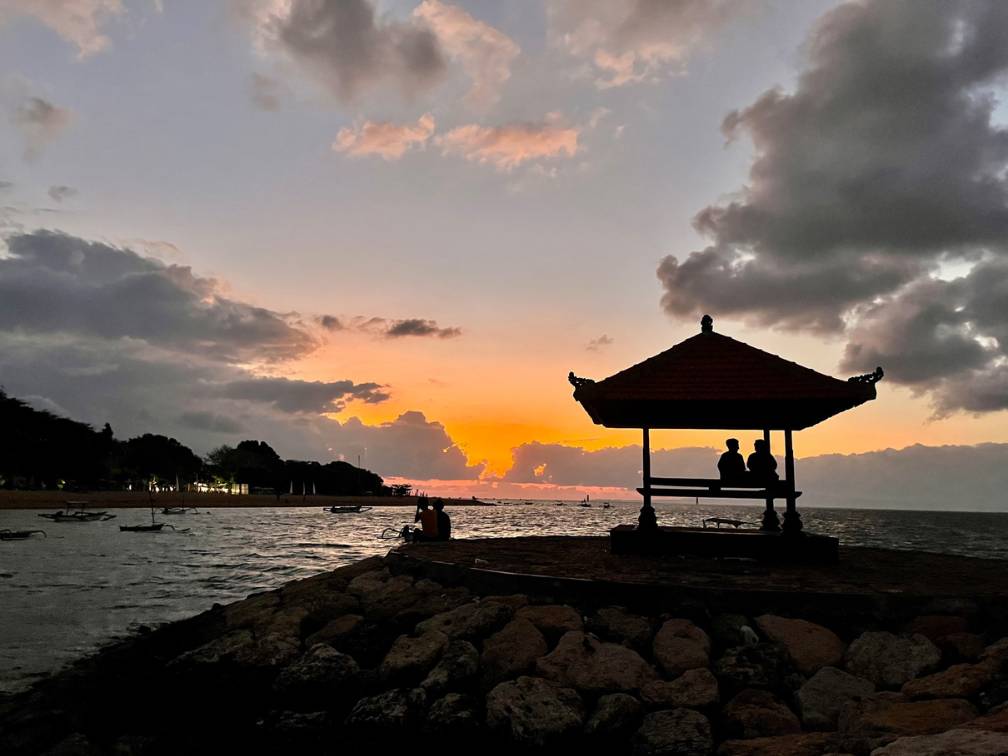 Sunrise over gazebo in Bali