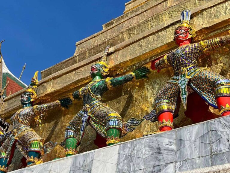 Colorful mosaic figures on Bangkok temple