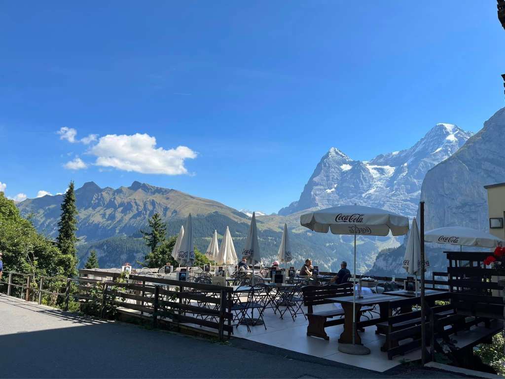 outdoor cafe overlooking swiss alps