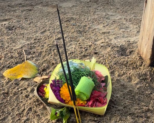 Balinese offering on beach