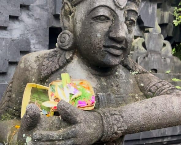 Balinese offering on statue