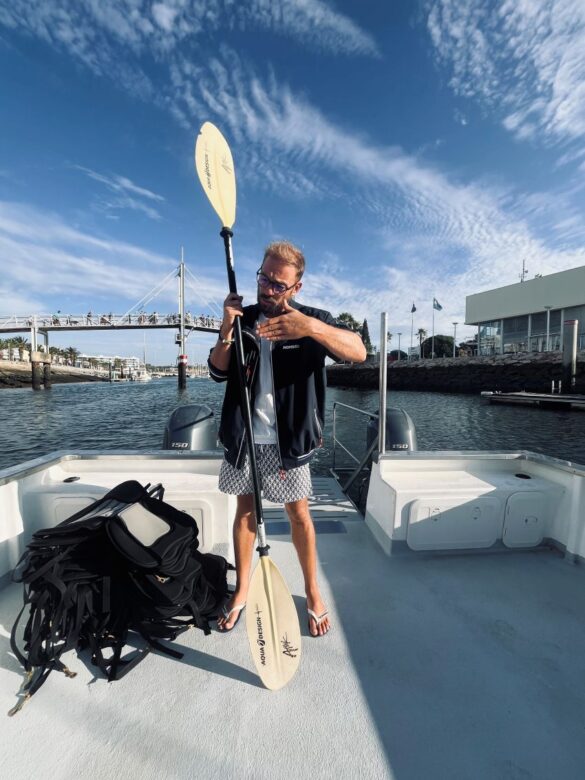 kayak instructor holding paddle